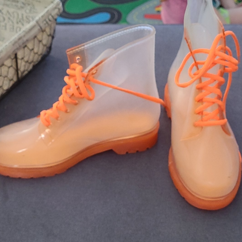 Clear boots with orange heels